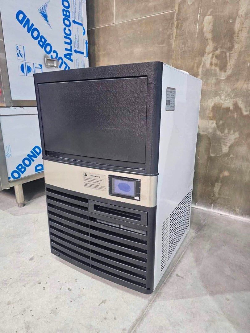 Compact Ice Cube Machine 60KG (Category: Industrial Equipment) located in Manila. Submitted by jackelyn_kwprofessional (Listing ID 1458622754, Image 1). Description: Compact Ice Machine DIMENSIONS: 50 x 62 x 84 cm Specifications: Daily Capacity: 60kg · Ice Cube Size: 22*22*22 mm · Compressor: Embraco · Voltage: 220V / 60 Hz / 420 W · Air Cooling · Ergonomic Design for Easy Maintenance · · Portable (can be used with or without waterline) · 1 Year 