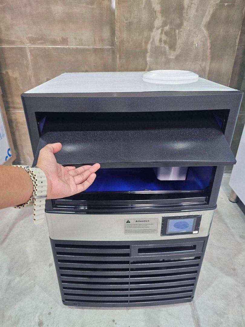Compact Ice Cube Machine 60KG (Category: Industrial Equipment) located in Manila. Submitted by jackelyn_kwprofessional (Listing ID 1458622754, Image 2). Description: Compact Ice Machine DIMENSIONS: 50 x 62 x 84 cm Specifications: Daily Capacity: 60kg · Ice Cube Size: 22*22*22 mm · Compressor: Embraco · Voltage: 220V / 60 Hz / 420 W · Air Cooling · Ergonomic Design for Easy Maintenance · · Portable (can be used with or without waterline) · 1 Year 