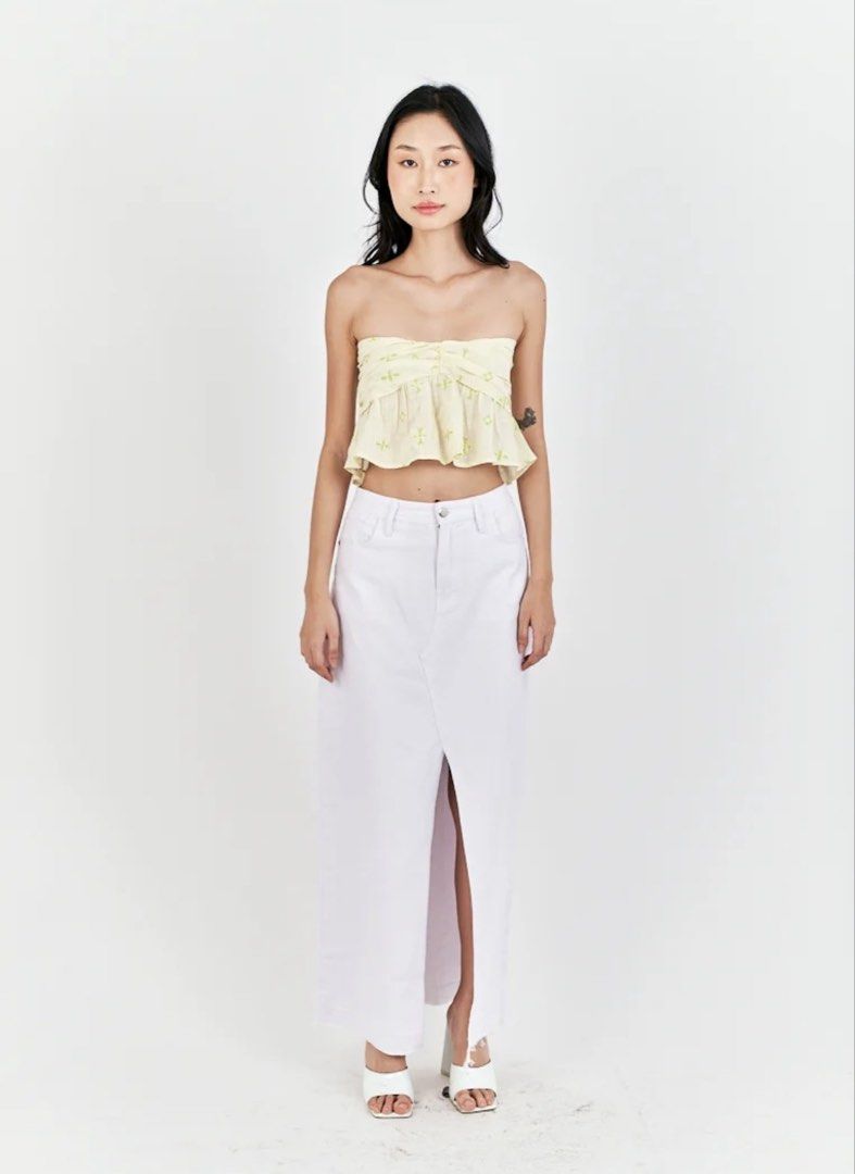 Cream Smocked Tube Top (Category: Sleeveless) located in Cainta. Submitted by ktktscloset (Listing ID 1458688144, Image 2). Description: - rfs: not using anymore - size: extra small - dm for more photos/videos payment method: gcash or bank transfer shipping method: lalamove, j&t, grab.