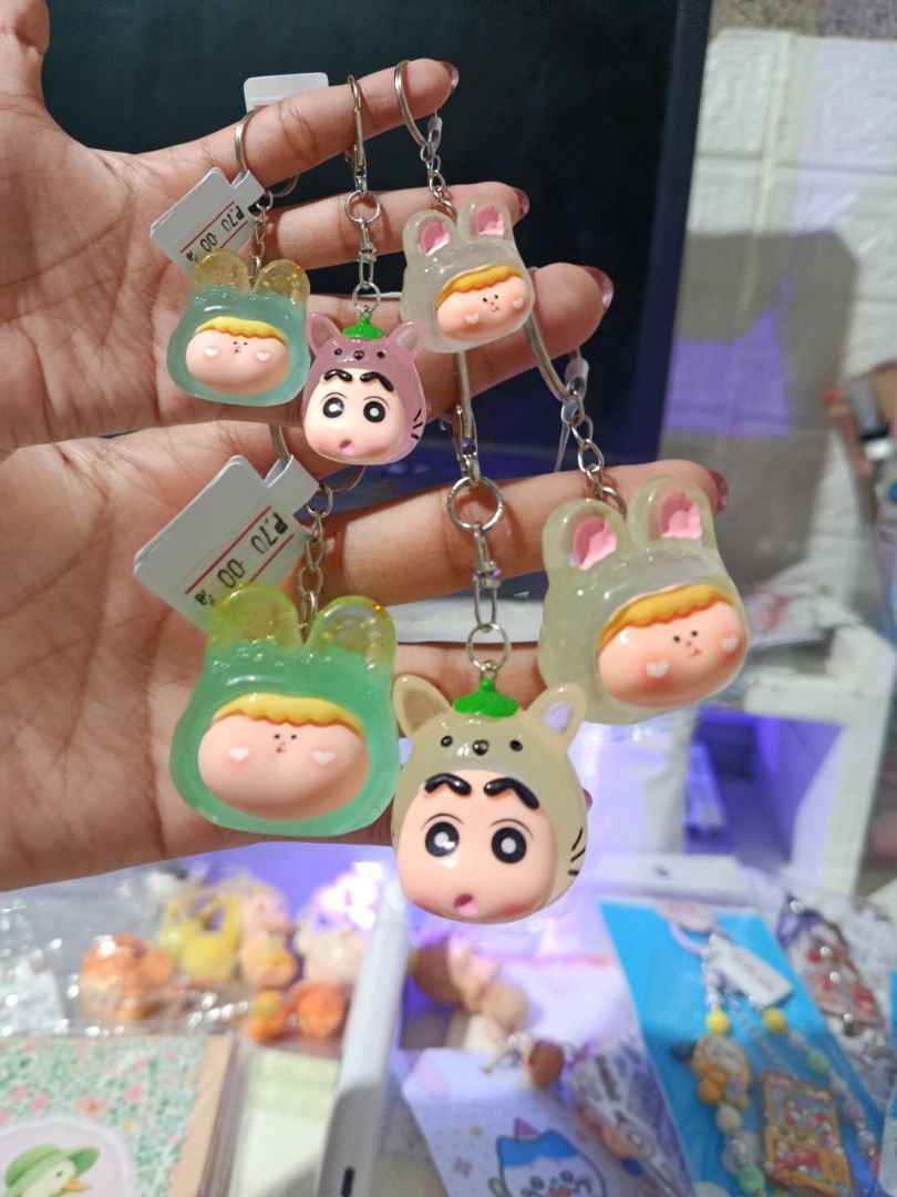 Cute Character Keychain Charms - Assorted Designs (Category: Character Goods) located in Cagayan de Oro. Submitted by yourownstyleapparel (Listing ID 1458680739, Image 1). Description: - Adorable character keychain charms - Perfect for bags, backpacks, or keys - Each charm features a unique design - Made from durable resin - Includes a sturdy metal keyring - Makes a great gift or personal accessory.