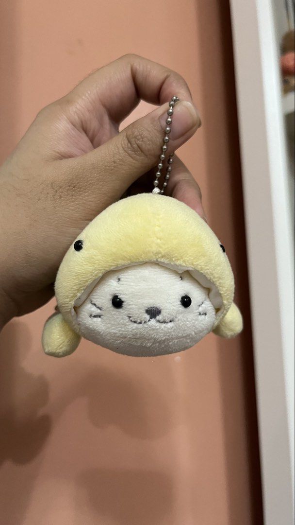 Cute Seal Turtle Plush Keychain (Category: Plushies & Soft Toys) located in Tagaytay City. Submitted by jujujewel (Listing ID 1458514790, Image 1). Description: - Adorable plush keychain - Features a seal wearing a turtle costume - Includes a metal ball chain - Great for decorating bags or keys - Super soft and cute accessory.