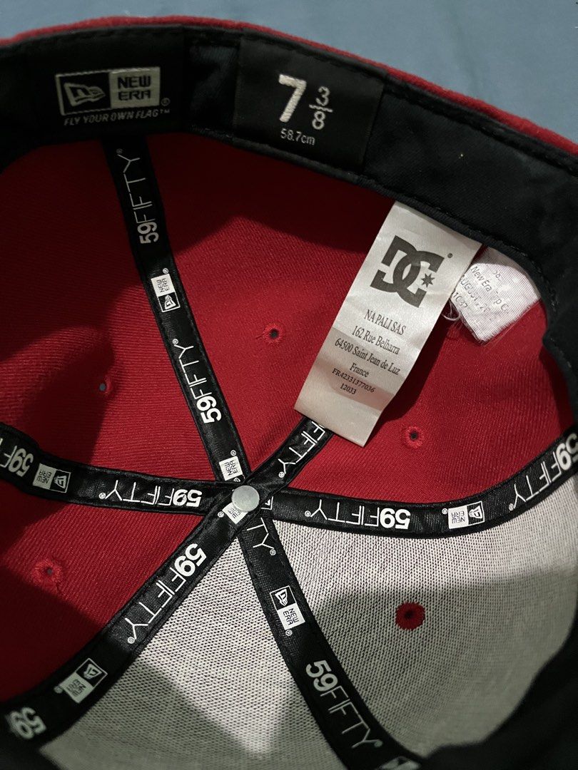 DC Shoes New Era 59FIFTY Fitted Cap Red (Category: Caps & Hats) located in Manila. Submitted by apelocharl08330 (Listing ID 1458539745, Image 3). Description: - Brand: DC Shoes - Style: New Era 59FIFTY Fitted Cap - Size: 7 3/8 - Origin: Made in Bangladesh - Features: DC logo on front and back - Condition: lightly used - Ideal for: Everyday wear.