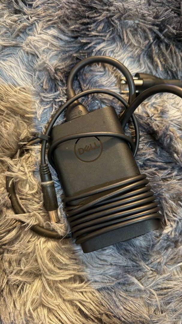 Dell 65W AC/DC Adapter Charger (Category: Chargers) located in Manila. Submitted by sweetpotato25 (Listing ID 1458672045, Image 1). Description: RFS: from my previous laptop - Genuine Dell 65W AC/DC Adapter - Model: Dell P/N: 0T9V19 - Input: 100-240V~1.3A 50-60Hz - Output: 19.5V 3.34A - Perfectly working .