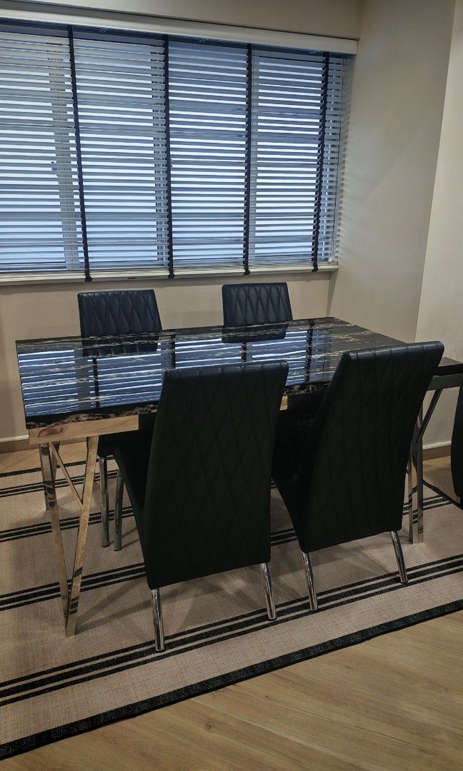 Dining table set (Category: Tables & Sets) located in Singapore. Submitted by ayullurveffa (Listing ID 1458623647, Image 1). Description: Solid marble dining table with 4 dining chairs. Very sturdy. This is a 4 seater dining table. Table has no rust Chairs has some rust. Able to fit into a resale and Bto gate. Length:150cm Width:90cm Pls arrange own transport.price is non negotiable. Non refundable.