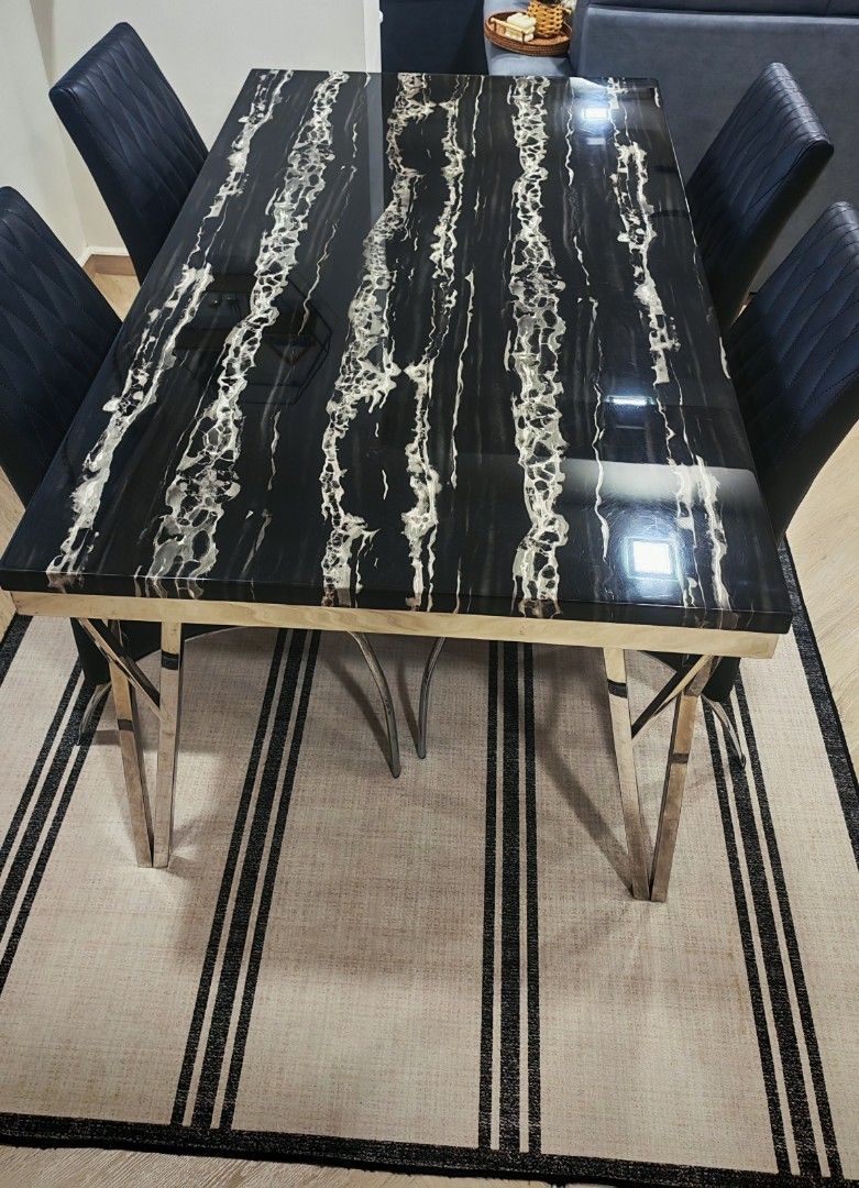 Dining table set (Category: Tables & Sets) located in Singapore. Submitted by ayullurveffa (Listing ID 1458623647, Image 2). Description: Solid marble dining table with 4 dining chairs. Very sturdy. This is a 4 seater dining table. Table has no rust Chairs has some rust. Able to fit into a resale and Bto gate. Length:150cm Width:90cm Pls arrange own transport.price is non negotiable. Non refundable.