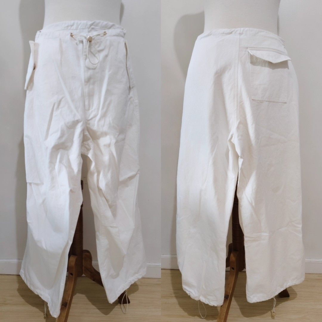 Dion Lee style white cotton cargo pants (Category: Other Bottoms) located in Mandaluyong City. Submitted by lovelabelsph (Listing ID 1458518902, Image 1). Description: White 100% organic cotton cargo pants Brand: Dymentional Style is very Dion Lee Php400 Price is firm Shipping not included Size marked L but best fits M Measurements laid flat across in inches: Waist 14.5 Length 38.5 Fabric has no stretch Used 1x in overall excellent condition exce