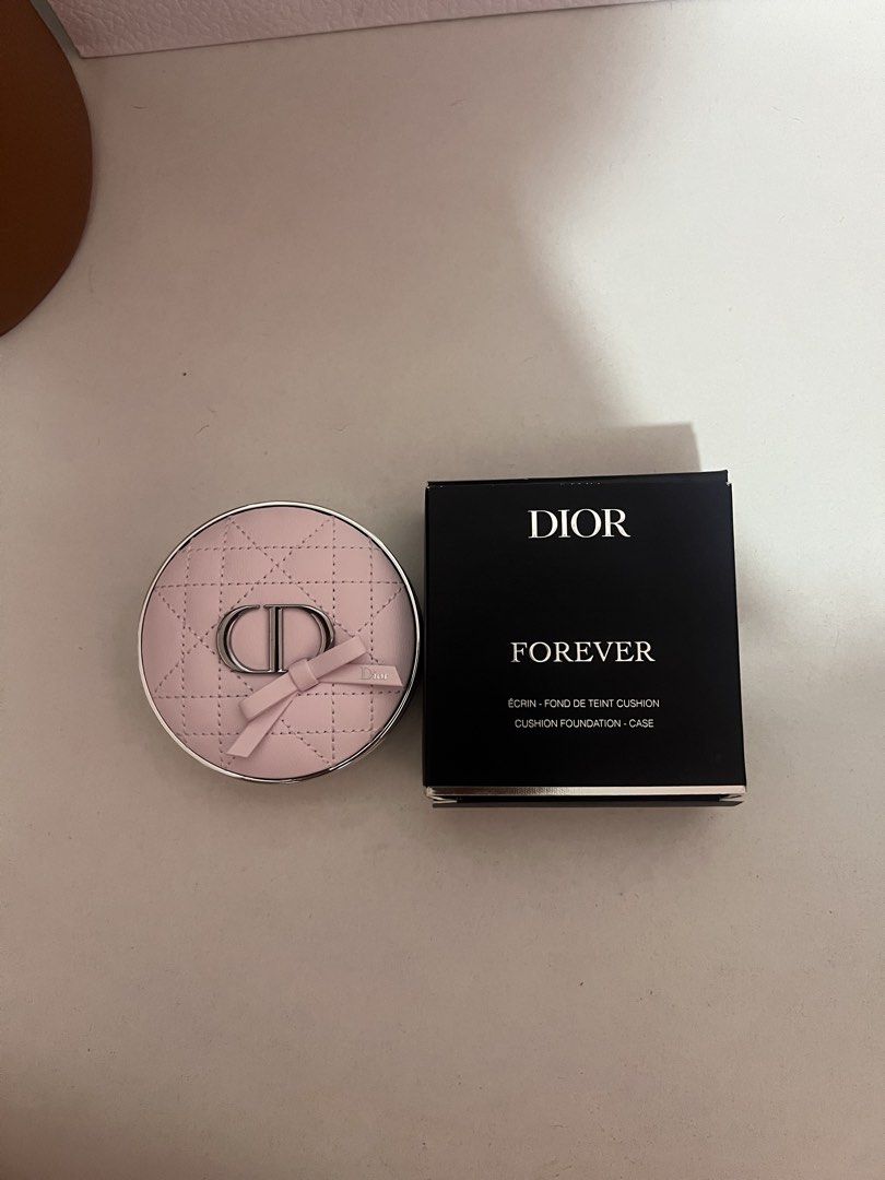 Dior Forever Cushion Foundation Case - Pink Ribbon (Category: Makeup) located in Manila. Submitted by saintkisser (Listing ID 1458679126, Image 1). Description: - Chic pink Dior Forever cushion foundation case. - Features iconic CD logo and a delicate ribbon detail. - This is for the case only; foundation refill not included. - Perfect for protecting and accessorizing your cushion compact. - A must-have cute accessory for Dior lovers!.