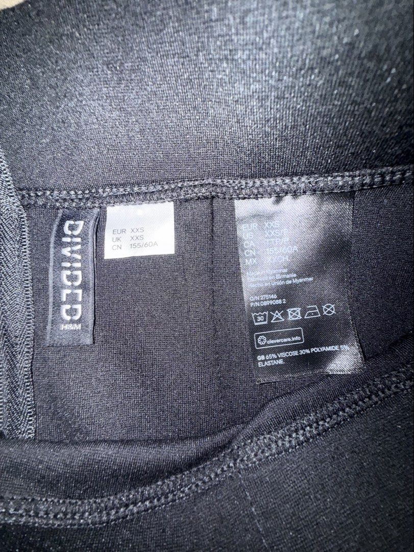 Divided H&M Black Mini Skirt XXS (Category: Skirts) located in Quezon City. Submitted by _cmls (Listing ID 1458538038, Image 3). Description: - Divided by H&M black mini skirt - Zipper closure at the back - Made from a viscose, polyamide, and elastane blend - Versatile basic piece for your wardrobe - Easy to dress up or down.