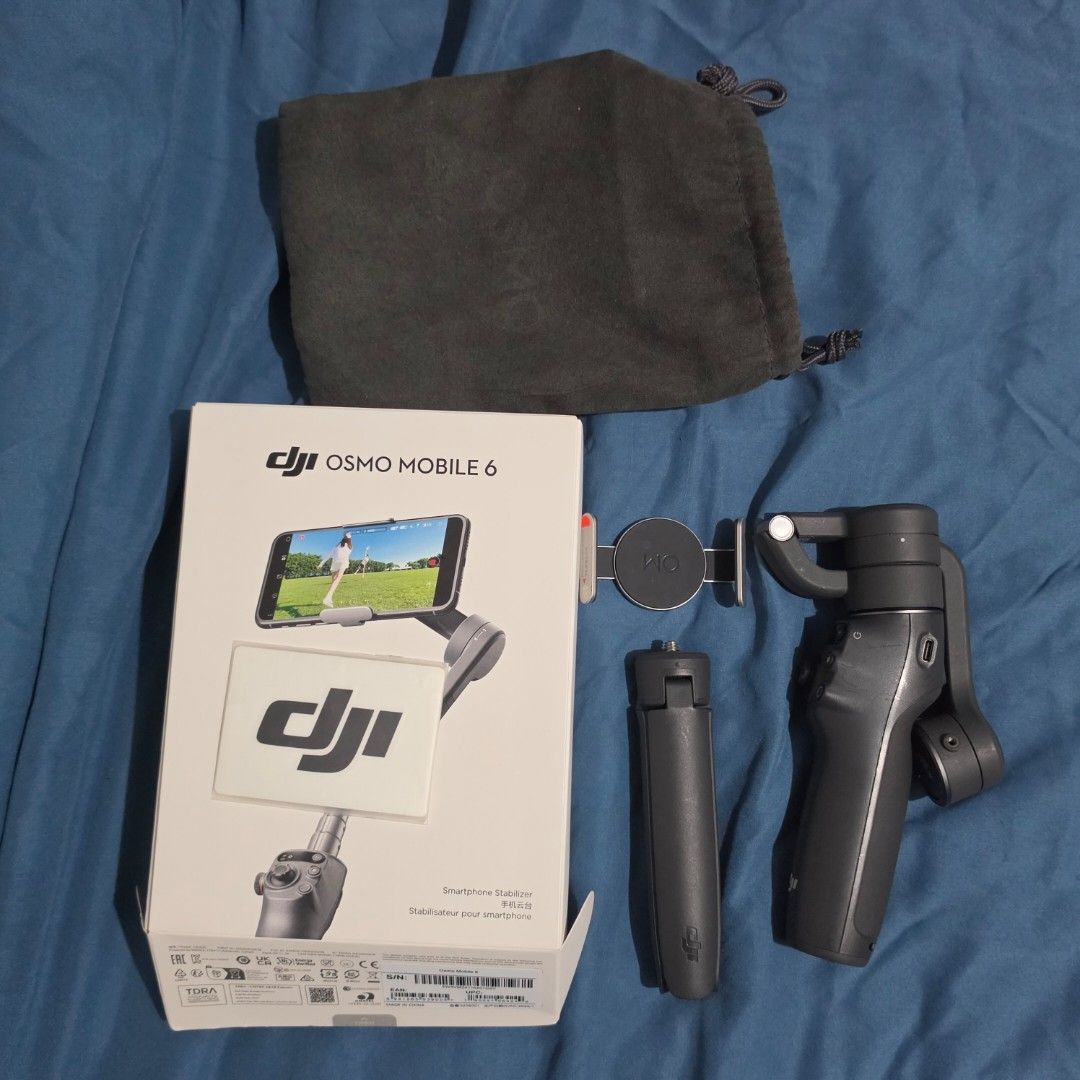 DJI Osmo Mobile 6 Gimbal Stabilizer (Category: Gimbals & Stabilizers ) located in Santa Rosa. Submitted by marionette2728 (Listing ID 1424520349, Image 1). Description: 🎀LAST PRICE🎀 LOC: Sta. Rosa, Laguna - DJI Osmo Mobile 6 gimbal stabilizer - Includes: gimbal, tripod, phone holder, carrying case, and box - Provides smooth and stable video recording - Ideal for vlogging and content creation - Capture professional-looking videos with your smart
