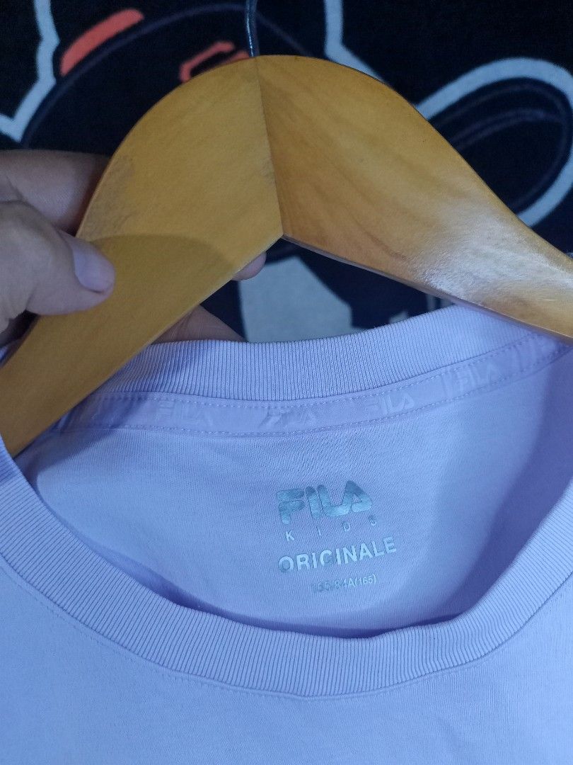 Fila Women's T-shirt (Category: Shirts) located in Castilla. Submitted by stignapamorma (Listing ID 1458679321, Image 3). Description: Branded Women's T-shirt ( Thrifted ) Size - 17.5x26 Condition - Excellent Color Rate - 9/10 Issue - None Price - 350+SF.