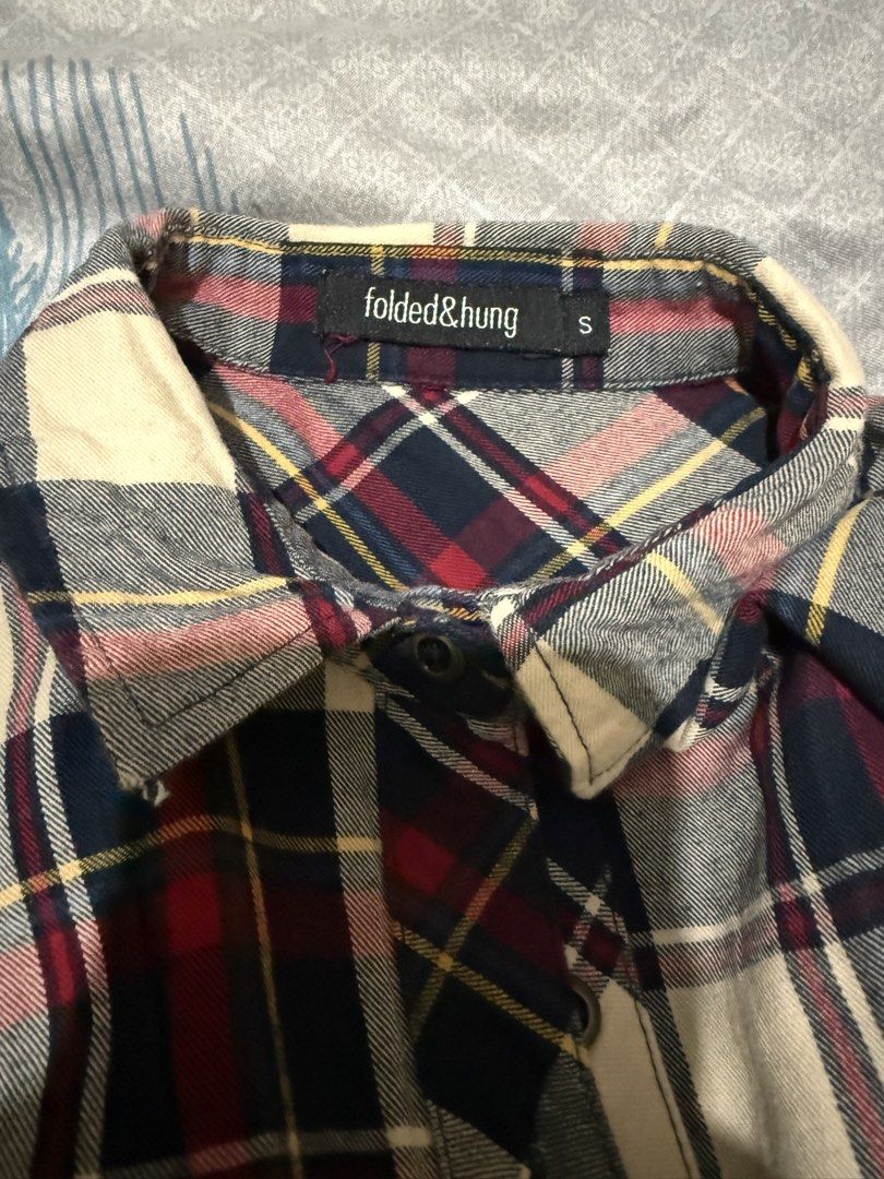 Folded & Hung Plaid Flannel Shirt Size S (Category: Longsleeves) located in Makati City. Submitted by refind.prelove.finds (Listing ID 1458641417, Image 3). Description: - Classic plaid flannel shirt - Used once - Features a button-up front - Two chest pockets - Versatile for layering or wearing solo - Comfortable and casual style.
