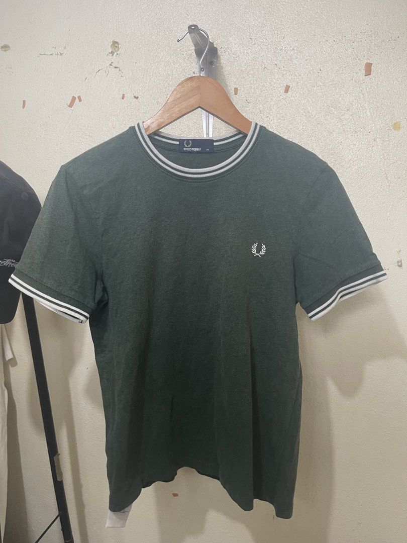 Fred Perry Twin Tipped Shirt (Category: Activewear) located in Tuguegarao City. Submitted by elyks11 (Listing ID 1458612473, Image 1). Description: GOOD AS NEW SOLID.