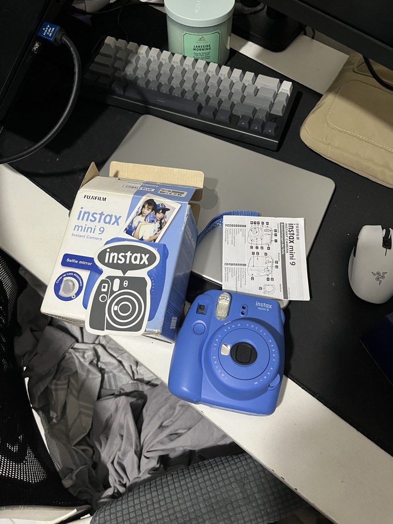 Fujifilm Instax Mini 9 Instant Camera - Blue (Category: Cameras) located in Cavite. Submitted by vantebles (Listing ID 1458635534, Image 2). Description: - Blue Fujifilm Instax Mini 9 camera - Includes original box and manual - Captures memories instantly - Easy to use, perfect for parties and events RFS: camera is broken (photos on film upon capturing appears black) but other than that, no issues battery port still working .