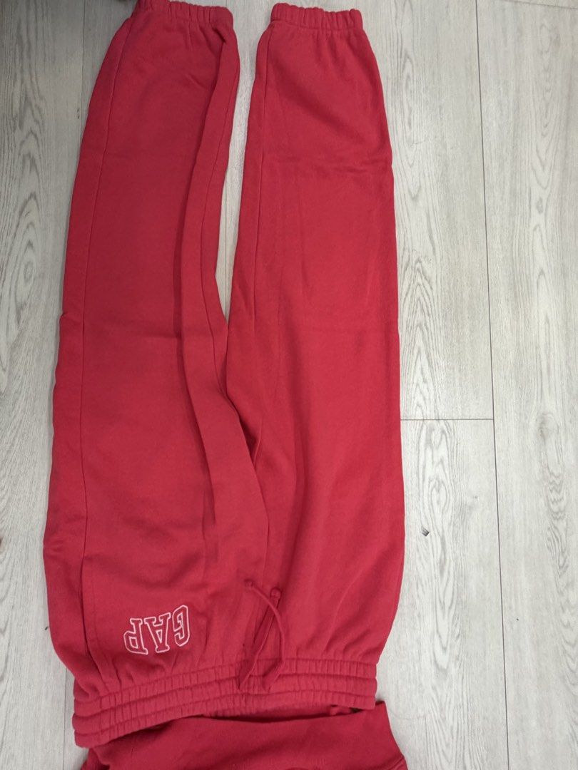 Gap Red Hoodie and Sweatpants Set (Category: Sets or Coordinates) located in Manila. Submitted by genyfurrose (Listing ID 1458607904, Image 2). Description: - Authentic Gap hoodie and matching sweatpants set. - Hoodie features a front pocket and adjustable drawstring hood. - Sweatpants have a comfortable elastic waistband with a drawstring. - Both pieces display the iconic Gap logo. - Ideal for a relaxed and casual look..