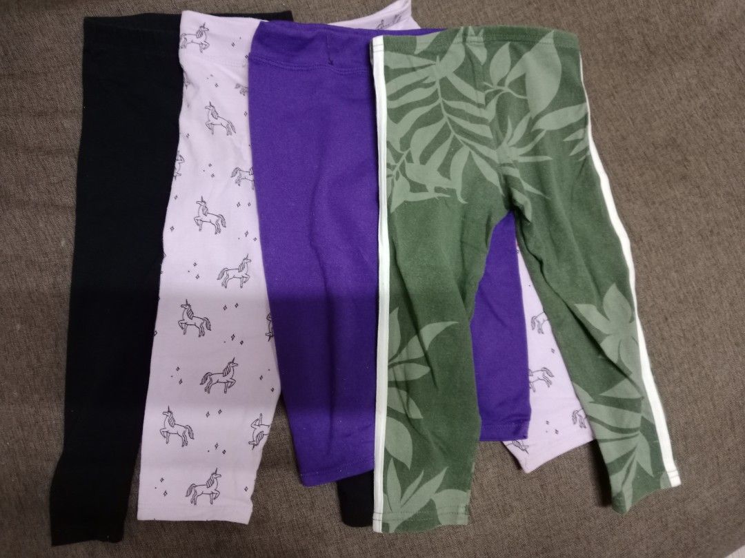 Girls' Leggings Bundle - Unicorn, Floral, Solid Colors (Category: Babies & Kids Fashion) located in Quezon City. Submitted by plethorastars (Listing ID 1458684311, Image 1). Description: - Bundle of 4 girls' leggings - Includes: 1 black, 1 light purple with unicorns, 1 solid purple, 1 green with leaf print & side stripes - Ideal for everyday wear and playtime.