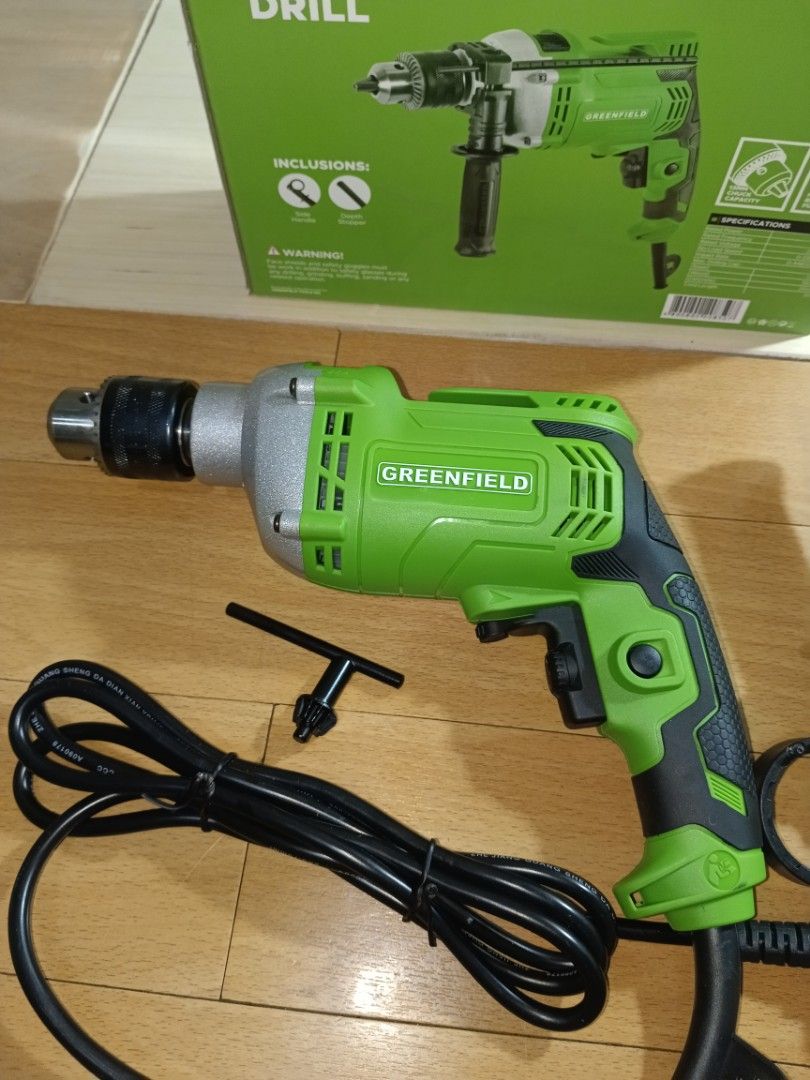 Greenfield 850W Impact Drill with Accessories (Category: Construction Tools & Equipment) located in Mandaluyong City. Submitted by lh4n15 (Listing ID 1458672041, Image 2). Description: brand new no issue - Greenfield 850W Impact Drill - Built for professionals - Ideal for DIY projects and construction work - Powerful and reliable performance - Includes: Drill, auxiliary handle, chuck key - Comes in original box - Corded electric power.