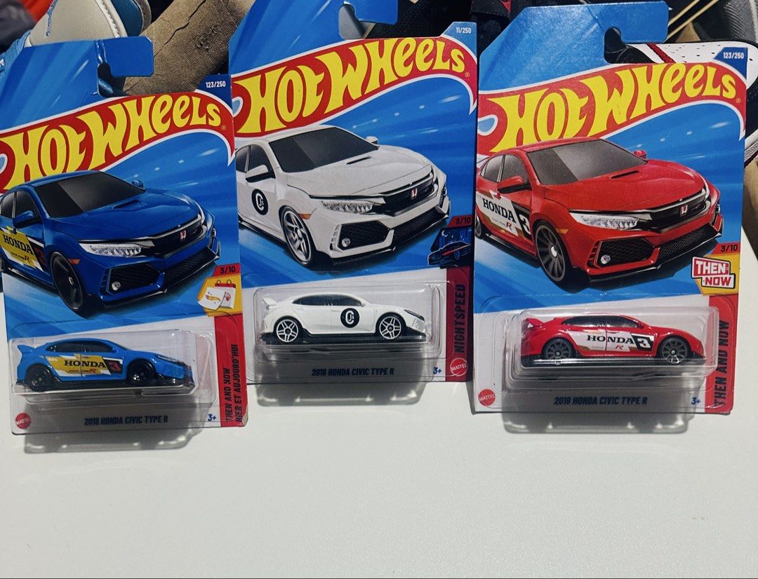 Hot Wheels – 2018 Honda Civic Type R (Category: Vehicle & Diecast Models) located in Manila. Submitted by got_loots (Listing ID 1458606454, Image 1). Description: Hot Wheels – 2018 Honda Civic Type R • Blue – ₱150 with card issue • White – ₱180 • Red (Then & Now) – ₱200 🔥 Take all 3 for ₱500.