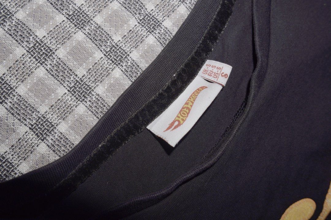 hot wheels graphic shirt (Category: Shirts) located in Batangas. Submitted by miuparfait (Listing ID 1458539122, Image 3). Description: black graphic shirt — ₱200 ⭑ brand: hot wheels ⭑ size: small ⭑ condition: 8/10 • the design is cracked, but it adds aura ⭑ mop: gotyme only ⭑ mod: jnt for the graphic tee enjoyers. the print has some cracking, but we’re calling it ‘character’. gives the shirt that worn-in, vintage-ish look that somehow makes it c