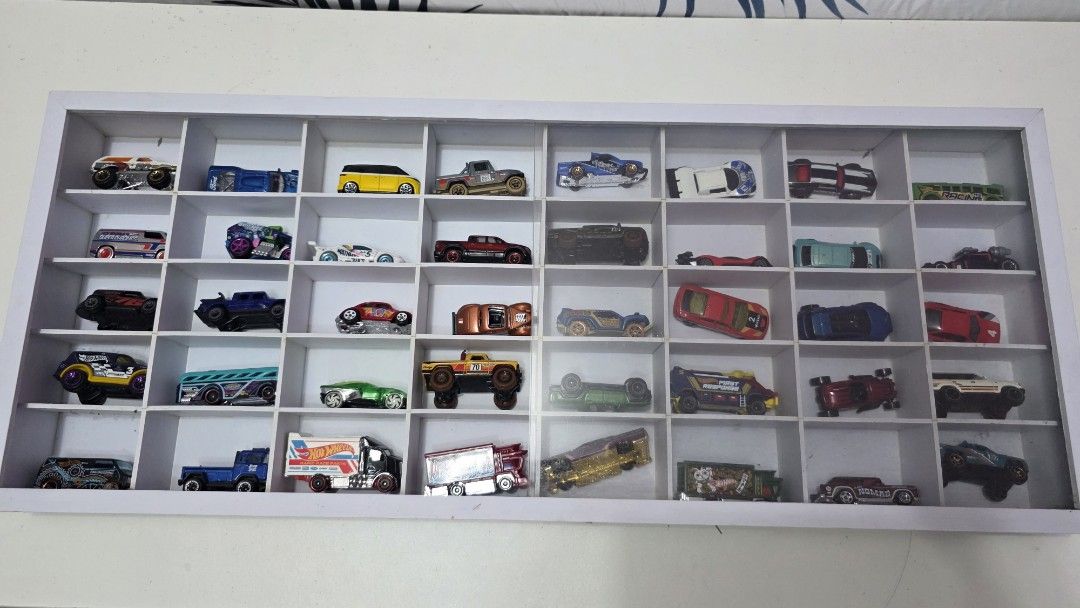 Hotwheels collection w/ display case (Category: Vehicle & Diecast Models) located in Rizal. Submitted by sebastian032. (Listing ID 1458684386, Image 2). Description: 🔥 **Hot Wheels Die-Cast Cars Collection with display case included A selection of Hot Wheels cars from my personal collection 🚗🏎️ Great for collectors, kids, or anyone who loves classic Hot Wheels! 📦 Pre-owned / displayed 📸 Actual items and photos posted ⭐ Various models and des