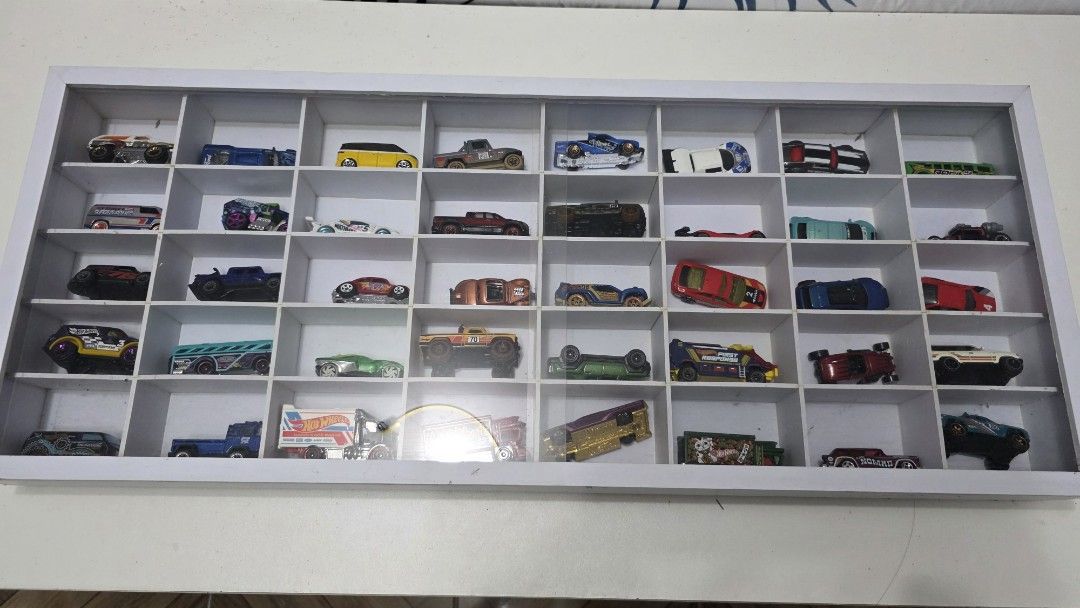 Hotwheels collection w/ display case (Category: Vehicle & Diecast Models) located in Rizal. Submitted by sebastian032. (Listing ID 1458684386, Image 1). Description: 🔥 **Hot Wheels Die-Cast Cars Collection with display case included A selection of Hot Wheels cars from my personal collection 🚗🏎️ Great for collectors, kids, or anyone who loves classic Hot Wheels! 📦 Pre-owned / displayed 📸 Actual items and photos posted ⭐ Various models and des