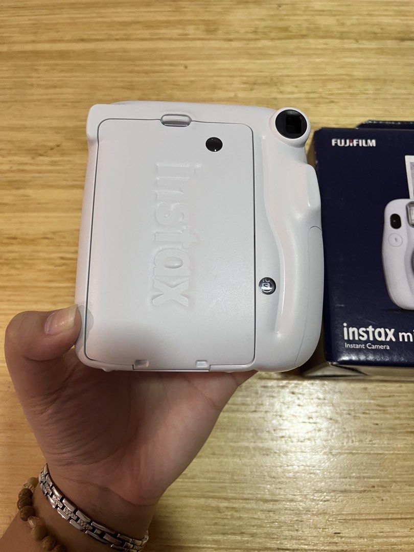 INSTAX MINI 11 (Category: Cameras) located in Paranaque City. Submitted by studiosecond (Listing ID 1458648347, Image 2). Description: - 3,000 pesos each - Sky blue - Ice white - sold - No defects - Used twice only.