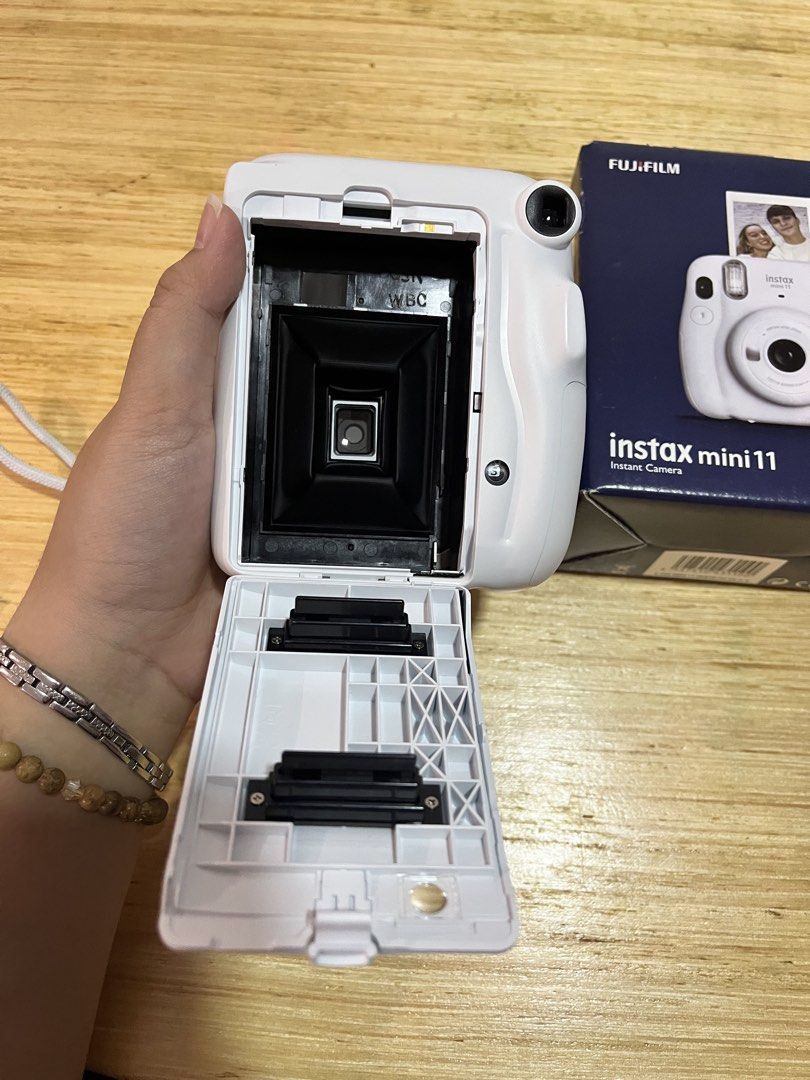 INSTAX MINI 11 (Category: Cameras) located in Paranaque City. Submitted by studiosecond (Listing ID 1458648347, Image 3). Description: - 3,000 pesos each - Sky blue - Ice white - sold - No defects - Used twice only.