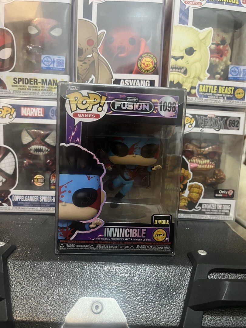 Invincible chase #1098 8.5/10 (Category: Raw Singles) located in Bulacan. Submitted by devegazul124 (Listing ID 1458684102, Image 1). Description: What you see is what you get, all pops are authentic, no low balling, trades are accepted depending on buyer’s offer, great for starting collectors and invincible fans, lastly pops behind are not included..