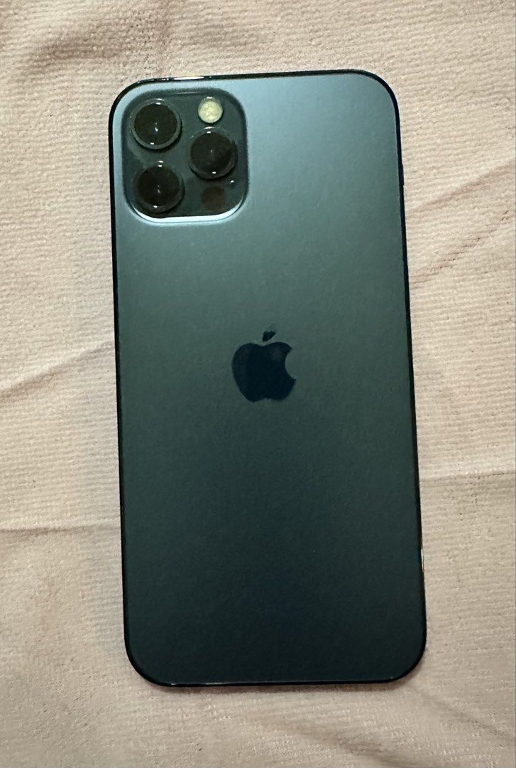 IPhone 12 Pro (Category: iPhone 12 Series) located in Mandaluyong City. Submitted by skol.le (Listing ID 1458679367, Image 2). Description: Excellent condition. All original. No repair/replace. No box/charger included. .