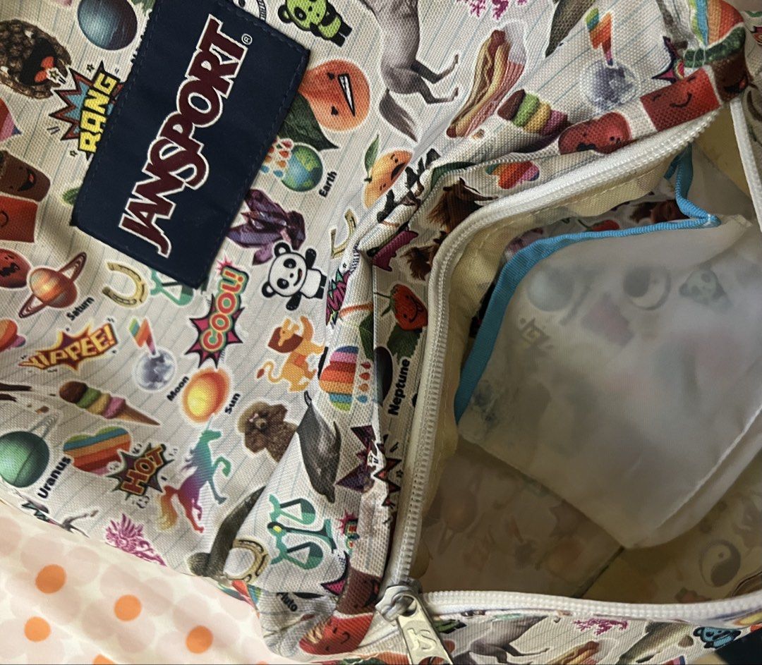 JanSport Backpack - Fun Sticker Print (Category: Backpacks) located in Manila. Submitted by bdeclutters_ (Listing ID 1458581800, Image 2). Description: - Fun all-over sticker print JanSport backpack - Main compartment for storage - Front zip pocket for quick access - Padded straps for comfortable carrying - Spacious interior for essentials - Perfect for school or everyday adventures Terms and Conditions 1. Mode of Delivery Delivery only. No meet-