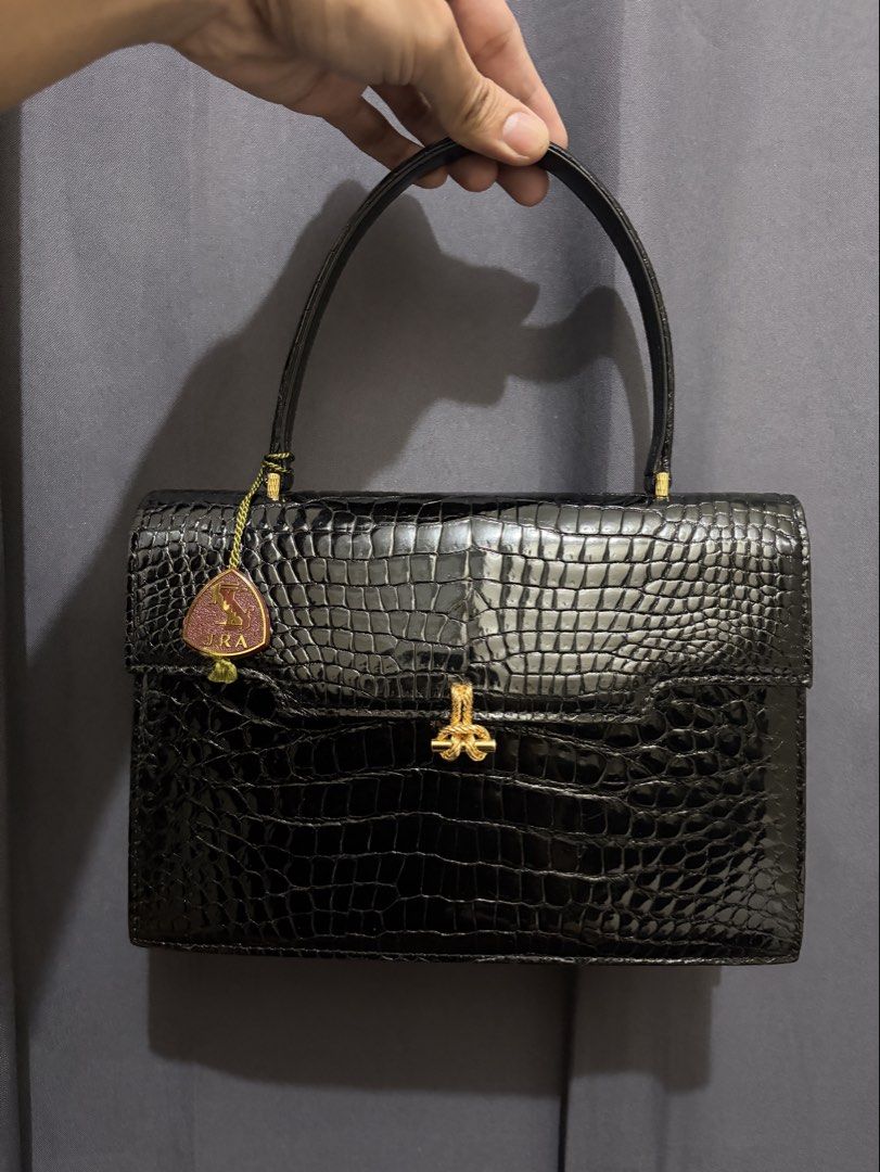 JRA Genuine Crocodile Belly Handbag (Category: Luxury Bags & Wallets) located in Munoz. Submitted by lolongs (Listing ID 1458682982, Image 3). Description: - JRA Genuine Crocodile Belly Crocskin Handbag - Exotic skin/Animal Skin - Comes with JRA maroon hangtag - Excellent vintage condition. Sobrang ganda and elegante nito sa personal - Pwede sa maarte wag lang sa sobrang selan - Kindly Check pictures for reference - perfect for occasion and night
