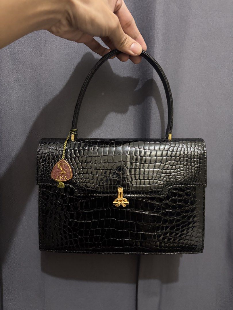 JRA Genuine Crocodile Belly Handbag (Category: Luxury Bags & Wallets) located in Munoz. Submitted by lolongs (Listing ID 1458682982, Image 1). Description: - JRA Genuine Crocodile Belly Crocskin Handbag - Exotic skin/Animal Skin - Comes with JRA maroon hangtag - Excellent vintage condition. Sobrang ganda and elegante nito sa personal - Pwede sa maarte wag lang sa sobrang selan - Kindly Check pictures for reference - perfect for occasion and night