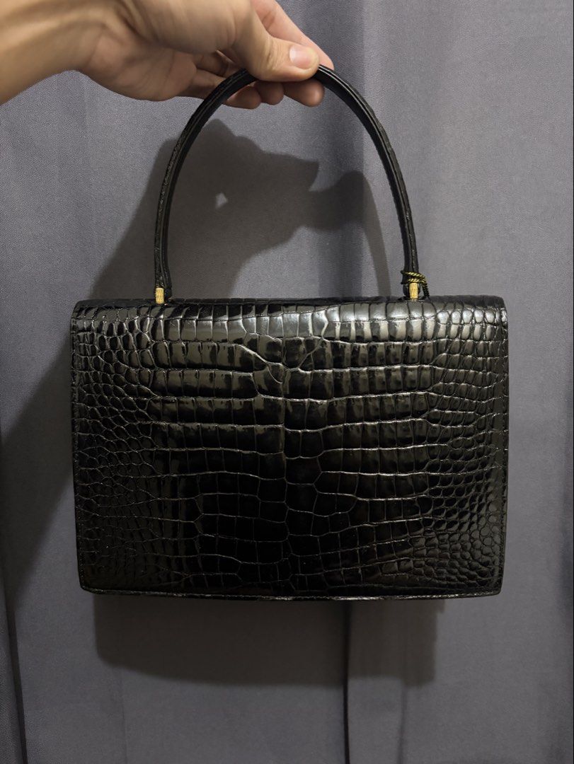 JRA Genuine Crocodile Belly Handbag (Category: Luxury Bags & Wallets) located in Munoz. Submitted by lolongs (Listing ID 1458682982, Image 2). Description: - JRA Genuine Crocodile Belly Crocskin Handbag - Exotic skin/Animal Skin - Comes with JRA maroon hangtag - Excellent vintage condition. Sobrang ganda and elegante nito sa personal - Pwede sa maarte wag lang sa sobrang selan - Kindly Check pictures for reference - perfect for occasion and night