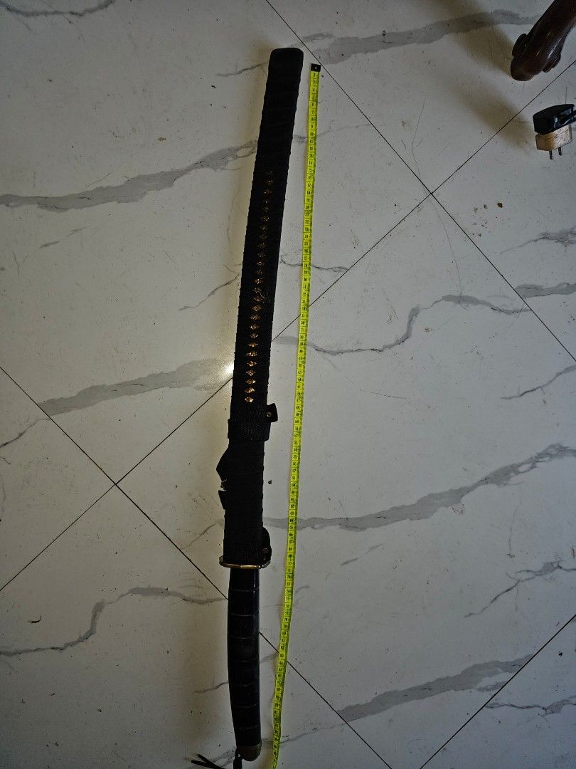 Katana Sword with Black Scabbard and Handle (Category: Combat Sports) located in Tagbilaran City. Submitted by lugarpogi (Listing ID 1458621514, Image 1). Description: in good condition.