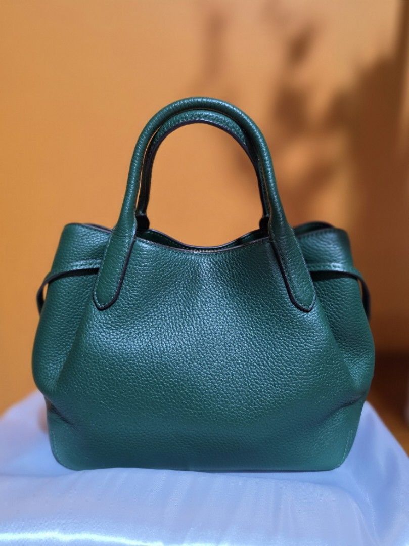 Kate Spade Green Leather Top Handle Bag with Strap (Category: Luxury Bags & Wallets) located in Pasig City. Submitted by miamendoza30 (Listing ID 1458532740, Image 2). Description: - Authentic Green Kate Spade Handbag - Pebbled Leather Texture - Top Handles & Detachable Crossbody Strap - Secure Zipper Closure - Multiple Interior Compartments - Elegant Gold Hardware Details - Comes with Original Dust Bag - Ideal for Everyday Use.