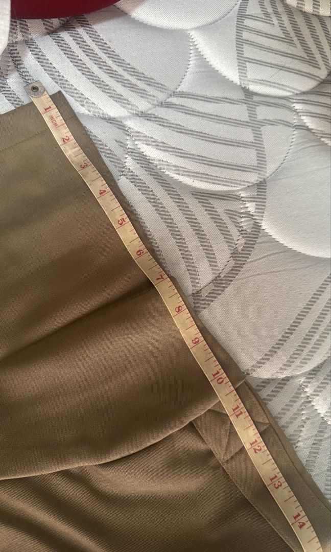 Khaki Short Sleeve Button-Up Shirt with Pockets (Category: Tshirts & Polo Shirts ) located in Bacoor. Submitted by _ibyangf (Listing ID 1458602820, Image 2). Description: - Khaki to brown short sleeve button-up shirt - Two chest pockets with button closures - Button-down front - Shoulder epaulets - Measurements on photos - Please check measurements before purchasing I have 8 of these, all Brand new, 2 medium, 2 Large, 5 XL. Khaki to Brown colors.