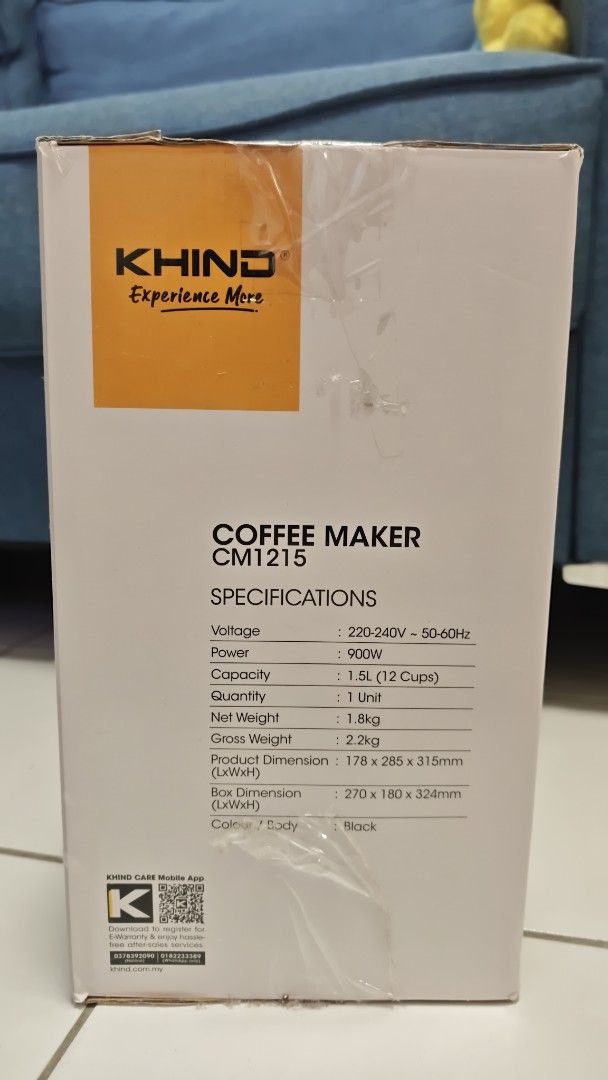 KHIND Coffee Maker CM1215 with Timer Function (Category: Coffee Machines & Makers) located in Kuala Lumpur. Submitted by nirzay5 (Listing ID 1458626309, Image 2). Description: Selling a KHIND coffee maker, model CM1215. It has a 1.5L capacity, making up to 12 cups. Features anti-drip, a removable filter basket, and a digital display with timer function. Power is 900W. Box dimensions are 270 x 180 x 324mm. Colour is black..