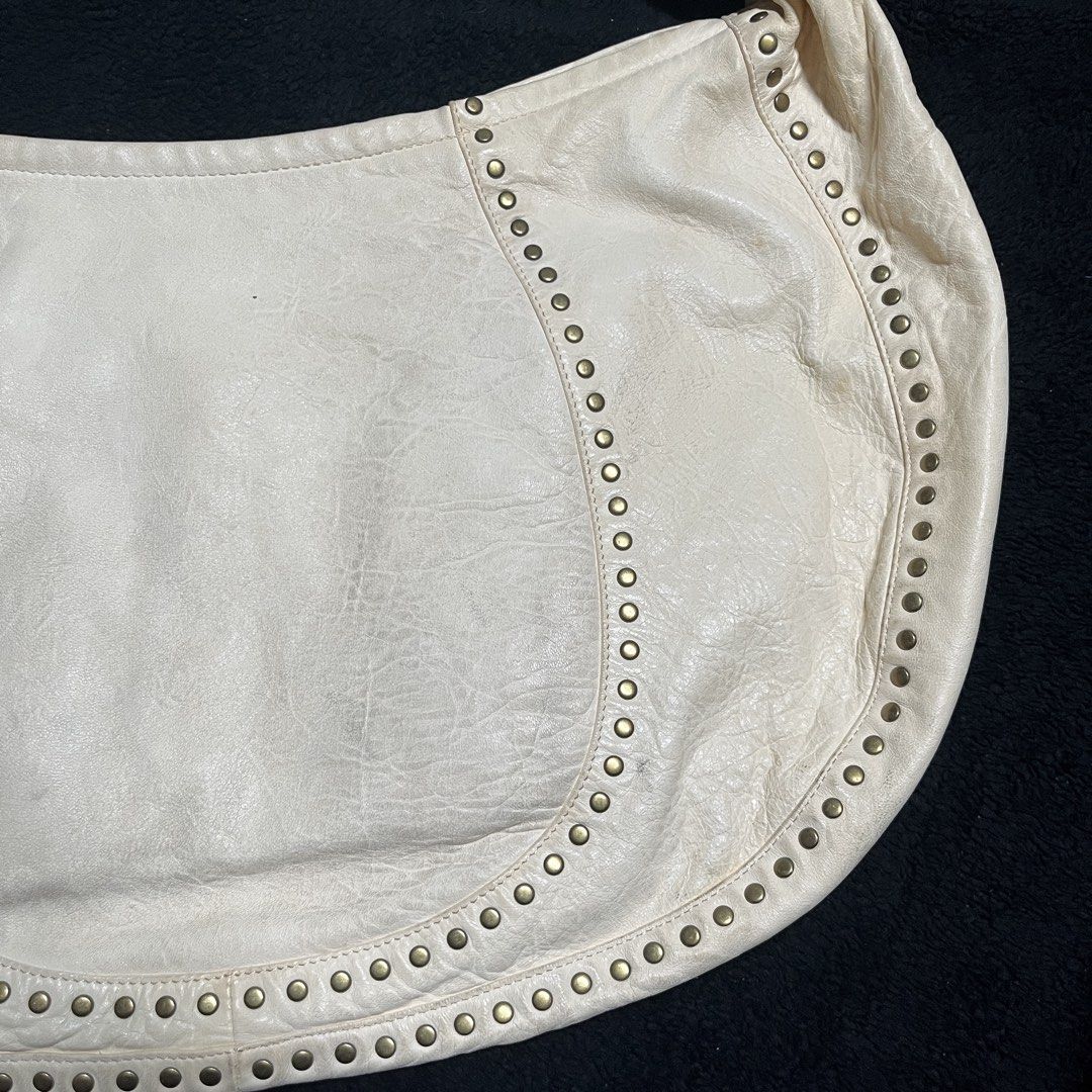 Kooba Y2k Hobo Bag (Category: Shoulder Bags) located in Marikina City. Submitted by wayupcollective (Listing ID 1458677450, Image 3). Description: Kooba Y2k Hobo Bag Excellent condition Yellowing parts No major flaws Measurement Length: 12” Width: 20” Handle drop: 8”.