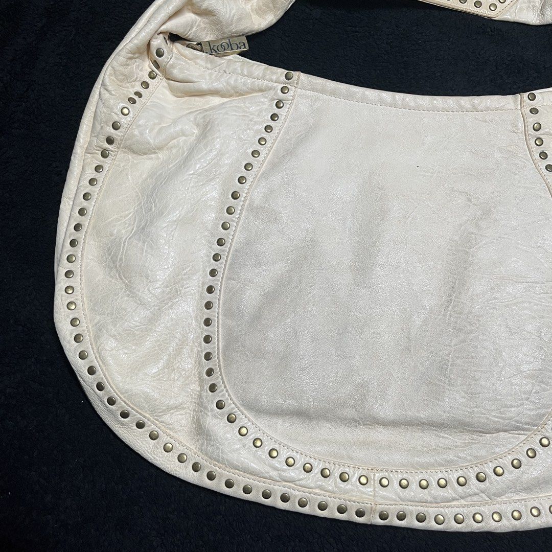 Kooba Y2k Hobo Bag (Category: Shoulder Bags) located in Marikina City. Submitted by wayupcollective (Listing ID 1458677450, Image 2). Description: Kooba Y2k Hobo Bag Excellent condition Yellowing parts No major flaws Measurement Length: 12” Width: 20” Handle drop: 8”.