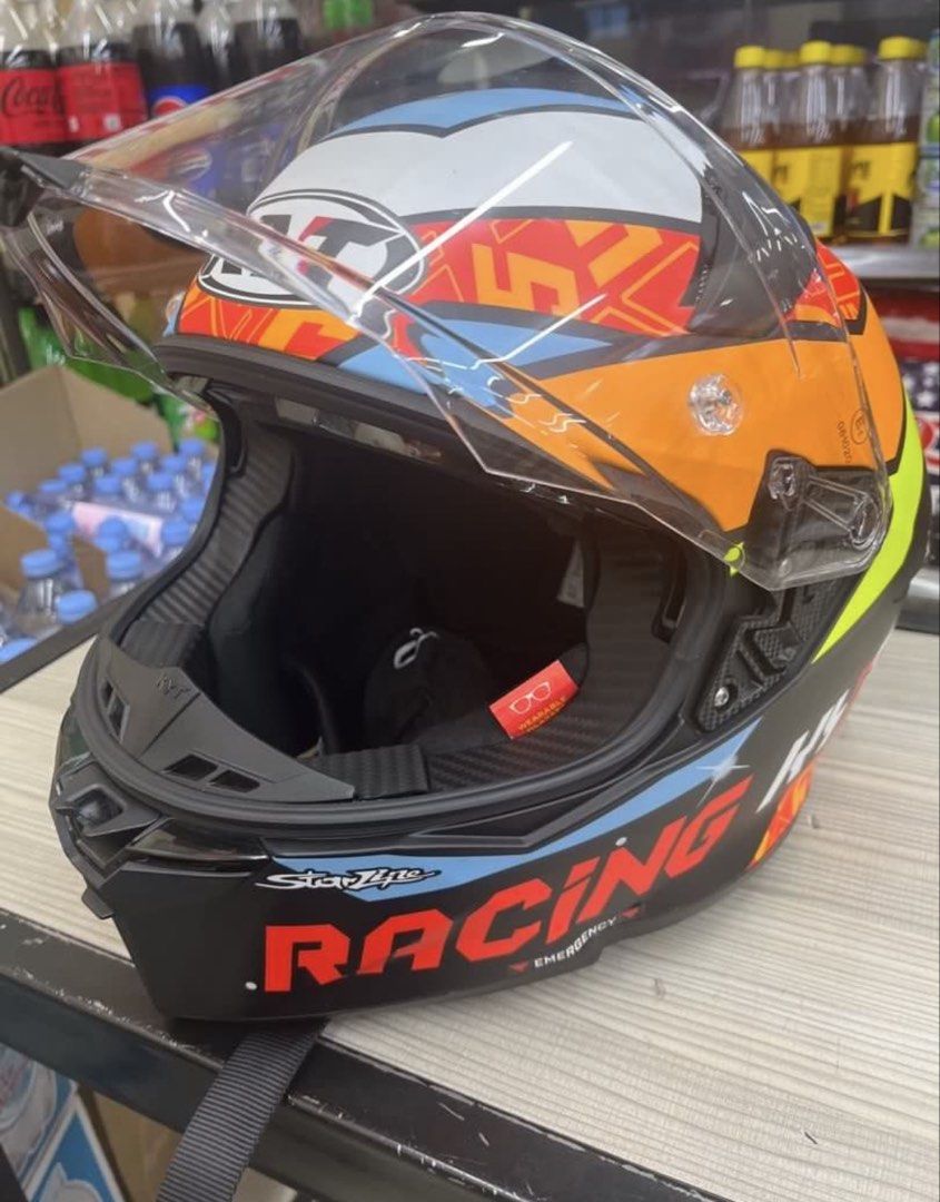 KYT Star Pilot Racing Full Face Helmet (Category: Helmets and other Riding Gears) located in Manila. Submitted by swifttiger_9a4195 (Listing ID 1458568223, Image 1). Description: - KYT R2R masia - Bold racing graphics with orange, yellow, and blue accents - Comes with a clear visor - Ideal for track days and street riding - Ready for your next adventure.