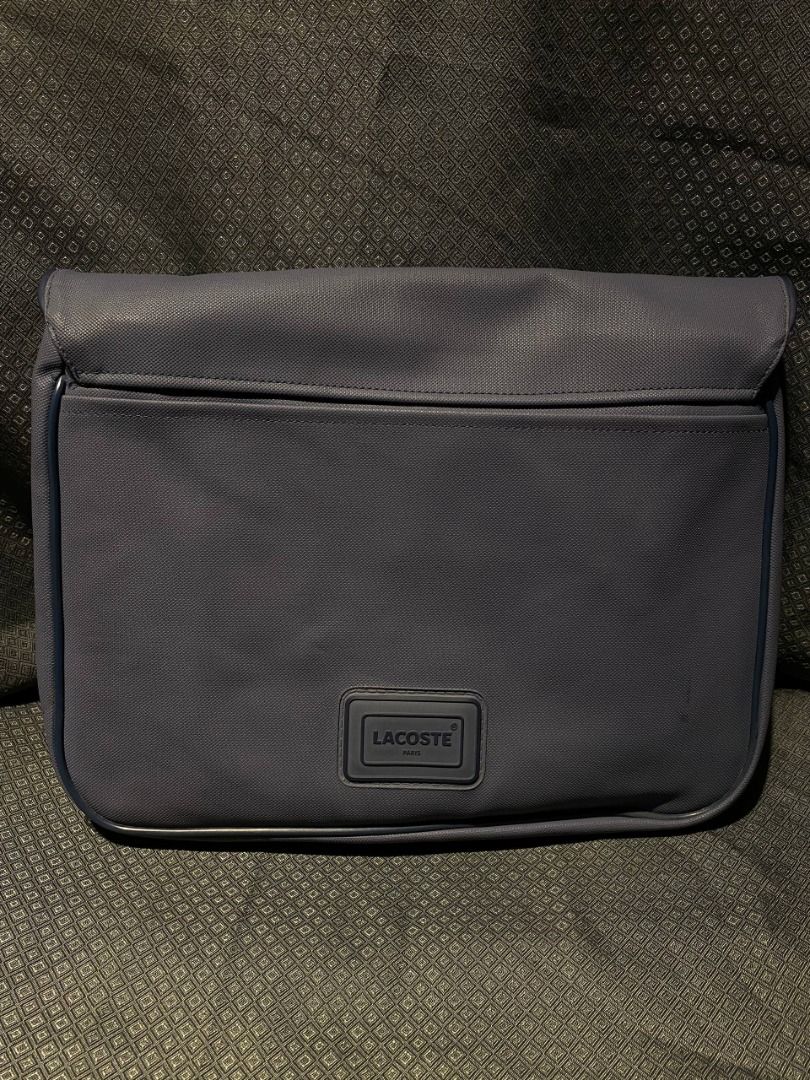Lacoste Expandable Messenger Bag (Category: Laptop Bags & Sleeves) located in Antipolo. Submitted by mogulcollective (Listing ID 1458680780, Image 2). Description: Lacoste Expandable Messenger Bag Authentic Excellent condition Features two main compartments with a zipped divider, has an accessible zip-fastened front pocket integrated into the flap, secured by twin buckle straps, two sub-pockets underneath the flap and large one at the rear, adjus