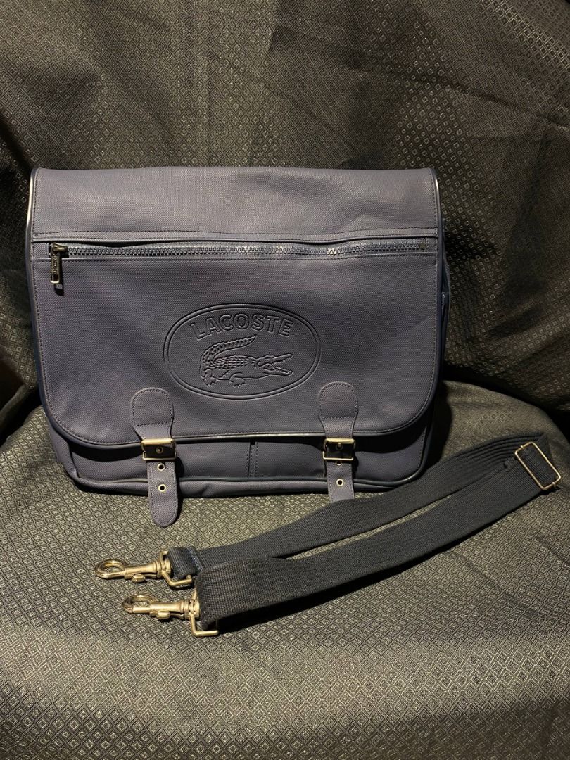 Lacoste Expandable Messenger Bag (Category: Laptop Bags & Sleeves) located in Antipolo. Submitted by mogulcollective (Listing ID 1458680780, Image 1). Description: Lacoste Expandable Messenger Bag Authentic Excellent condition Features two main compartments with a zipped divider, has an accessible zip-fastened front pocket integrated into the flap, secured by twin buckle straps, two sub-pockets underneath the flap and large one at the rear, adjus