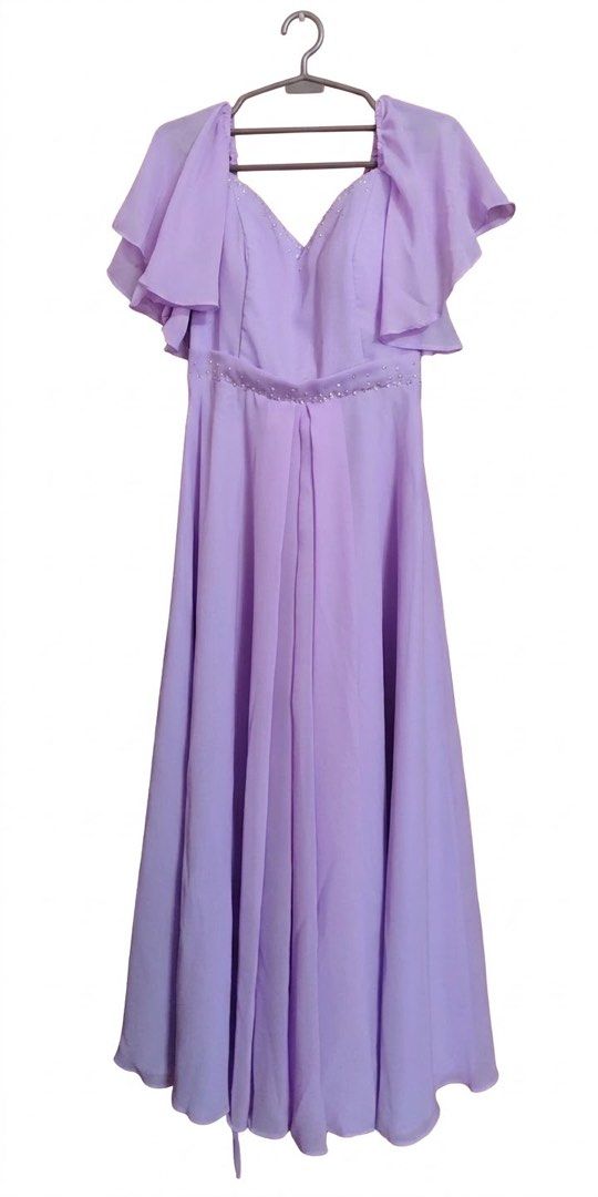 Lavender Formal Gown Beaded Waist (Category: Evening dresses & gowns) located in Manila. Submitted by declutter_rebuff (Listing ID 1458542327, Image 1). Description: - Beautiful lavender formal gown - Flattering sweetheartneckline - Delicate flutter capelet sleeves - Intricate beadwork accentuating the waist - Lace-up back closure with zipper - Flowy skirt with a subtle train - Perfect for weddings, proms, and other special occasions FITS MEDIUM 
