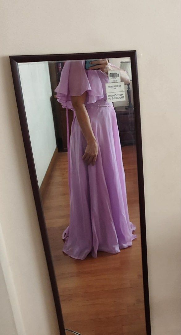 Lavender Formal Gown Beaded Waist (Category: Evening dresses & gowns) located in Manila. Submitted by declutter_rebuff (Listing ID 1458542327, Image 3). Description: - Beautiful lavender formal gown - Flattering sweetheartneckline - Delicate flutter capelet sleeves - Intricate beadwork accentuating the waist - Lace-up back closure with zipper - Flowy skirt with a subtle train - Perfect for weddings, proms, and other special occasions FITS MEDIUM 
