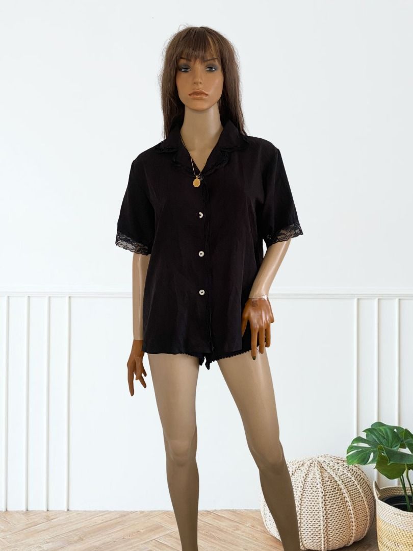 leloch.co | FT0560 | Large | Black Lace-Trim Button-Front Blouse (Category: Blouses) located in Mandaue City. Submitted by leloch.co (Listing ID 1458632463, Image 3). Description: 📌 IMPORTANT NOTE: The photos that the mannequin is wearing are actual. The human model is just an AI representation of how to style the clothes. Black Lace-Trim Button-Front Blouse Item Code: FT0560 Color: Black Size: Large Bust: 36–38 Style: Button-front blouse with l