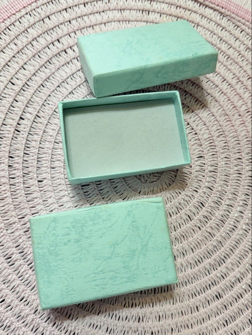 Light Blue Textured Jewelry Box with Lid (Category: Accessory Holder, Box & Organizers) located in Manila. Submitted by hellokittyjhoe (Listing ID 1458536127, Image 1). Description: - Light blue textured storage box - Comes with a separate lid - Soft, light blue lining inside - Ideal for storing jewelry, trinkets, or other small items - For rings, earrings, bracelets, anklets, or necklaces -300 each.