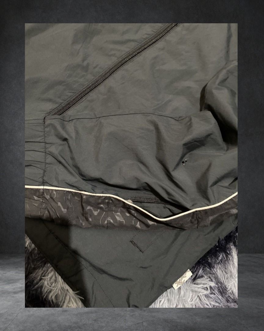 Li-Ning Black Track Jacket (Category: Coats, Jackets and Outerwear) located in Las Pinas. Submitted by w_thriftz (Listing ID 1458688143, Image 3). Description: W 23 L 28 Issue Hole in Left sleeve, tiny holes front area.