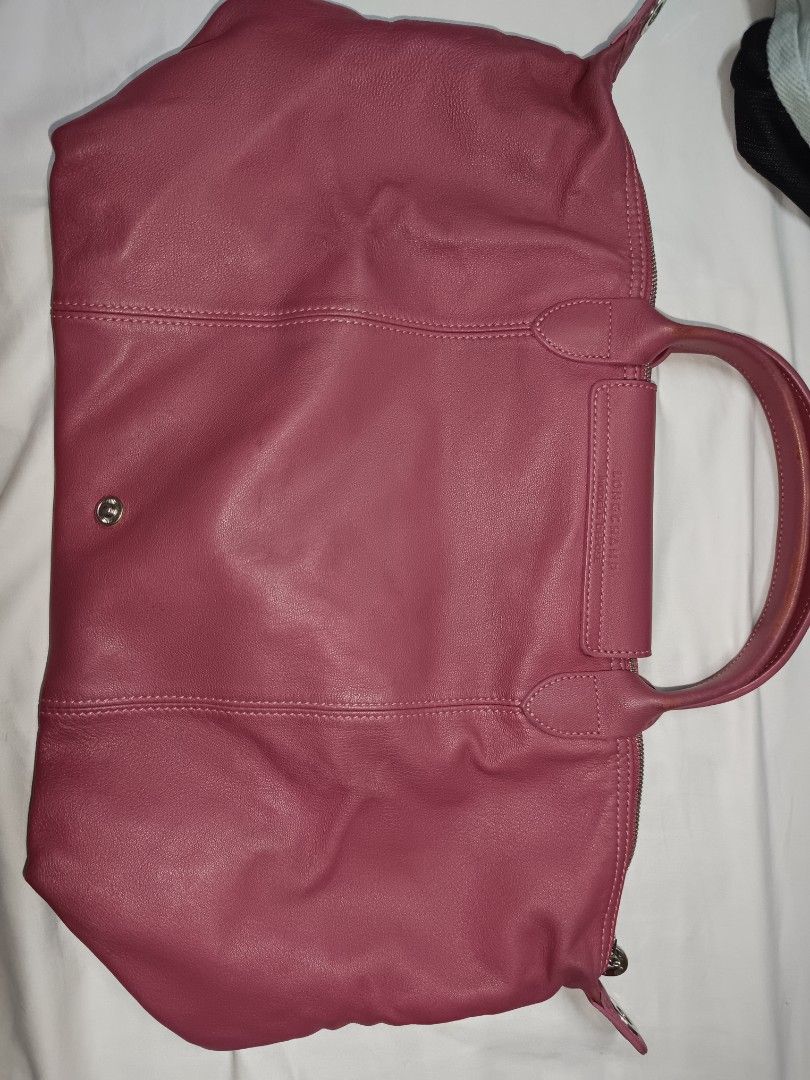 Longchamp Rose Pink Leather Tote Bag (Category: Luxury Bags & Wallets) located in Bulacan. Submitted by Ely1112222 (Listing ID 1458594698, Image 2). Description: -Original -No Price tag -No Dustbag - No strap - Authentic Longchamp tote bag - Soft rose pink leather - Spacious interior - Comfortable top handles - Secure zipper closure - Classic design for everyday use.