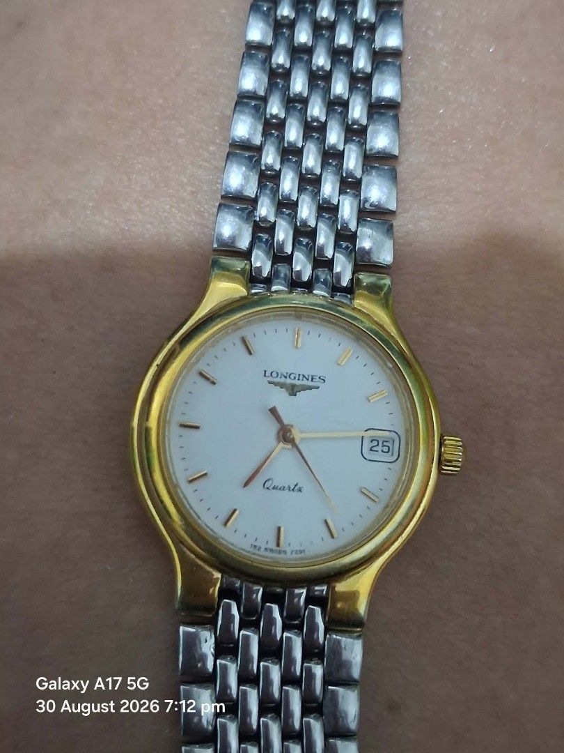 Longines Flagship Women's Watch (Category: Luxury Watches) located in Manila. Submitted by zenbear_9edcb3 (Listing ID 1458678590, Image 1). Description: - Classic Longines watch - White dial with gold-tone bezel - Stainless steel bracelet - Date window at 3 o'clock - Swiss made quartz movement - Versatile for everyday or special occasions - Sold as is.