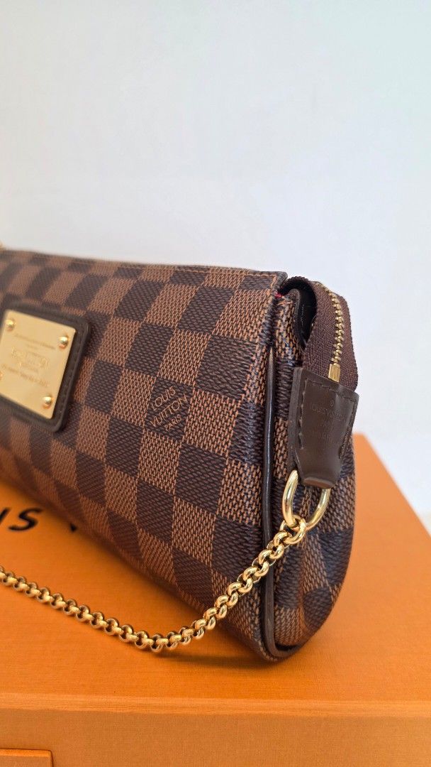 Louis Vuitton Eva Damier Ebene with Chain and Strap (Category: Luxury Bags & Wallets) located in San Fernando. Submitted by bagproject (Listing ID 1458683860, Image 3). Description: LV Eva Damier Ebene DU0132 Php 76,000 Rank SA-A W/ dust bag, box, chain strap, leather strap.