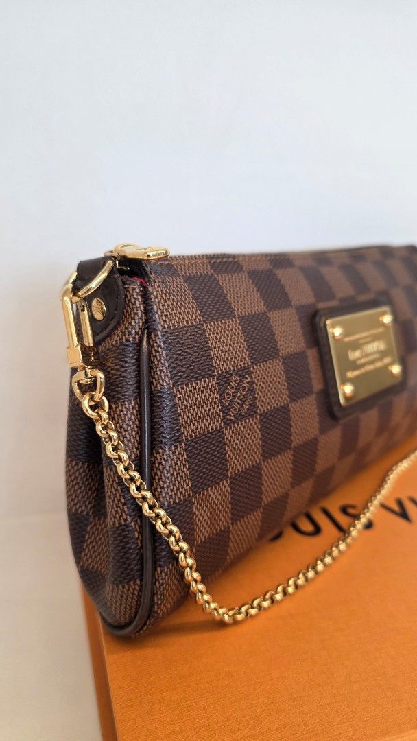 Louis Vuitton Eva Damier Ebene with Chain and Strap (Category: Luxury Bags & Wallets) located in San Fernando. Submitted by bagproject (Listing ID 1458683860, Image 2). Description: LV Eva Damier Ebene DU0132 Php 76,000 Rank SA-A W/ dust bag, box, chain strap, leather strap.